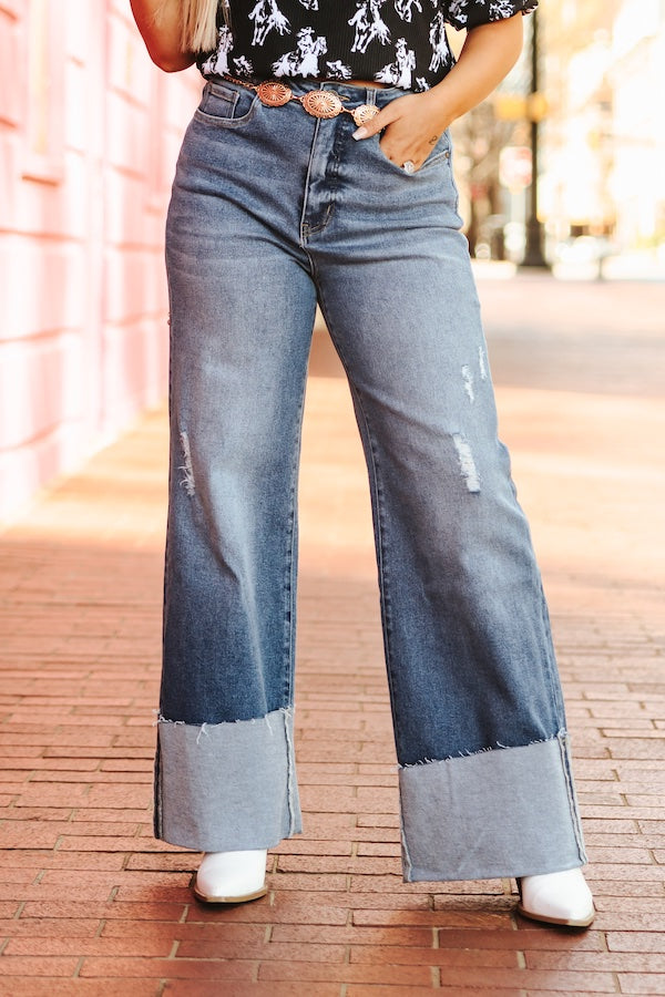 Women’s boutique denim with cuffed hem and wide leg style