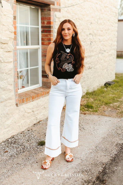 boutique statement jeans with fringe pockets and hem