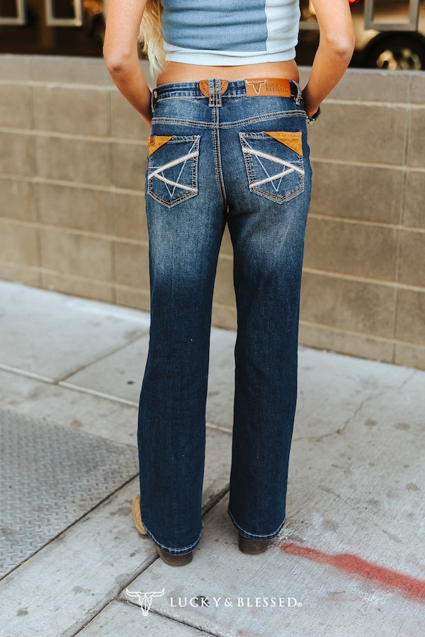 dark wash mid rise bootcut jeans with contrast stitching