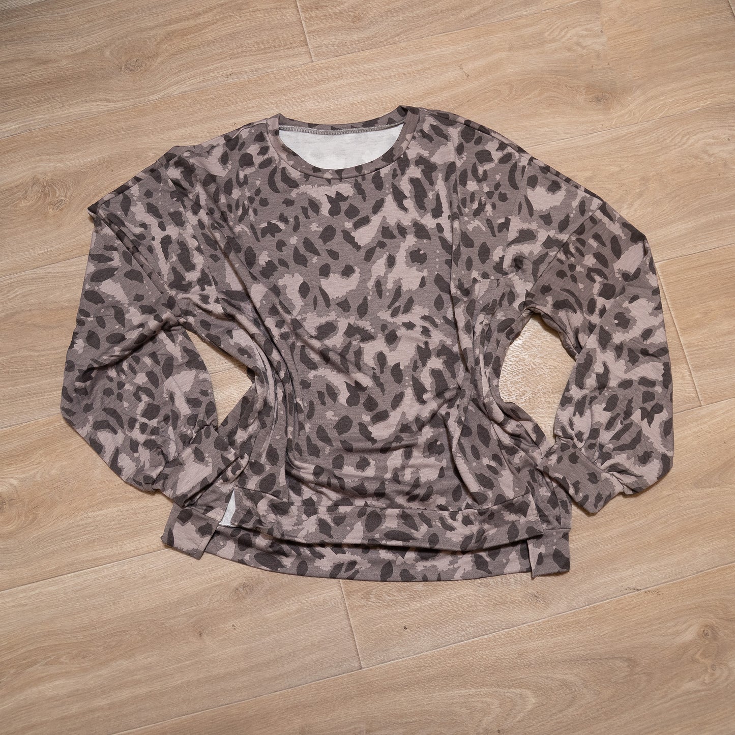 Neutral leopard print two piece lounge set with long sleeve top and elastic waist bottoms