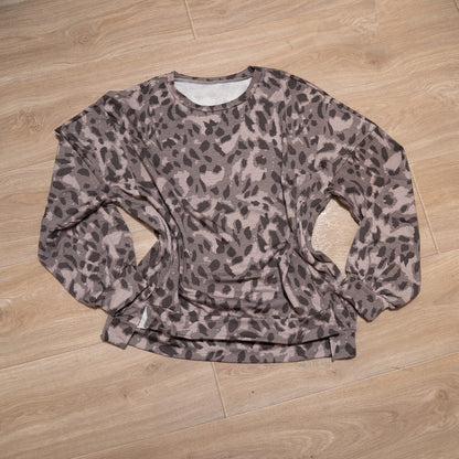 Neutral leopard print two piece lounge set with long sleeve top and elastic waist bottoms