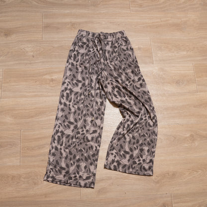 Neutral leopard print two piece lounge set with long sleeve top and elastic waist bottoms