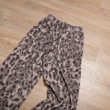 Neutral leopard print two piece lounge set with long sleeve top and elastic waist bottoms