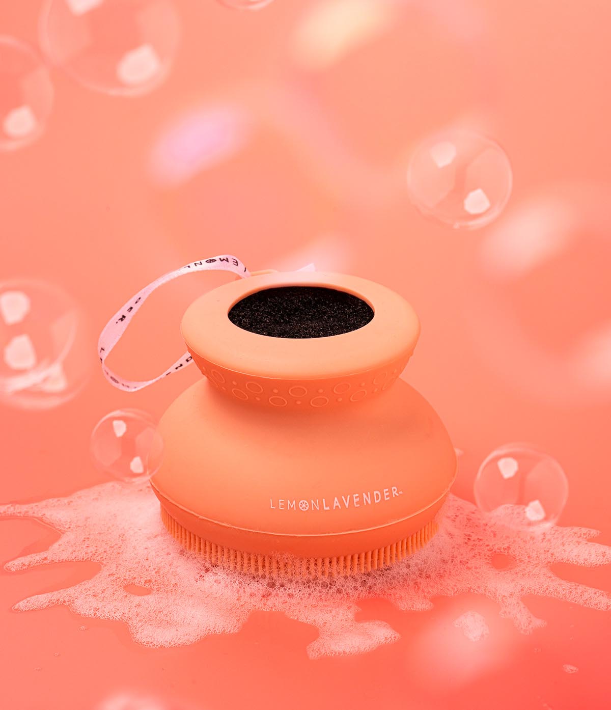 “Lemon Lavender silicone body scrubber in pastel color”

“Eco-friendly exfoliating brush with hanging loop and suction cup”

“Soft palm-sized silicone body scrubber for gentle cleansing”