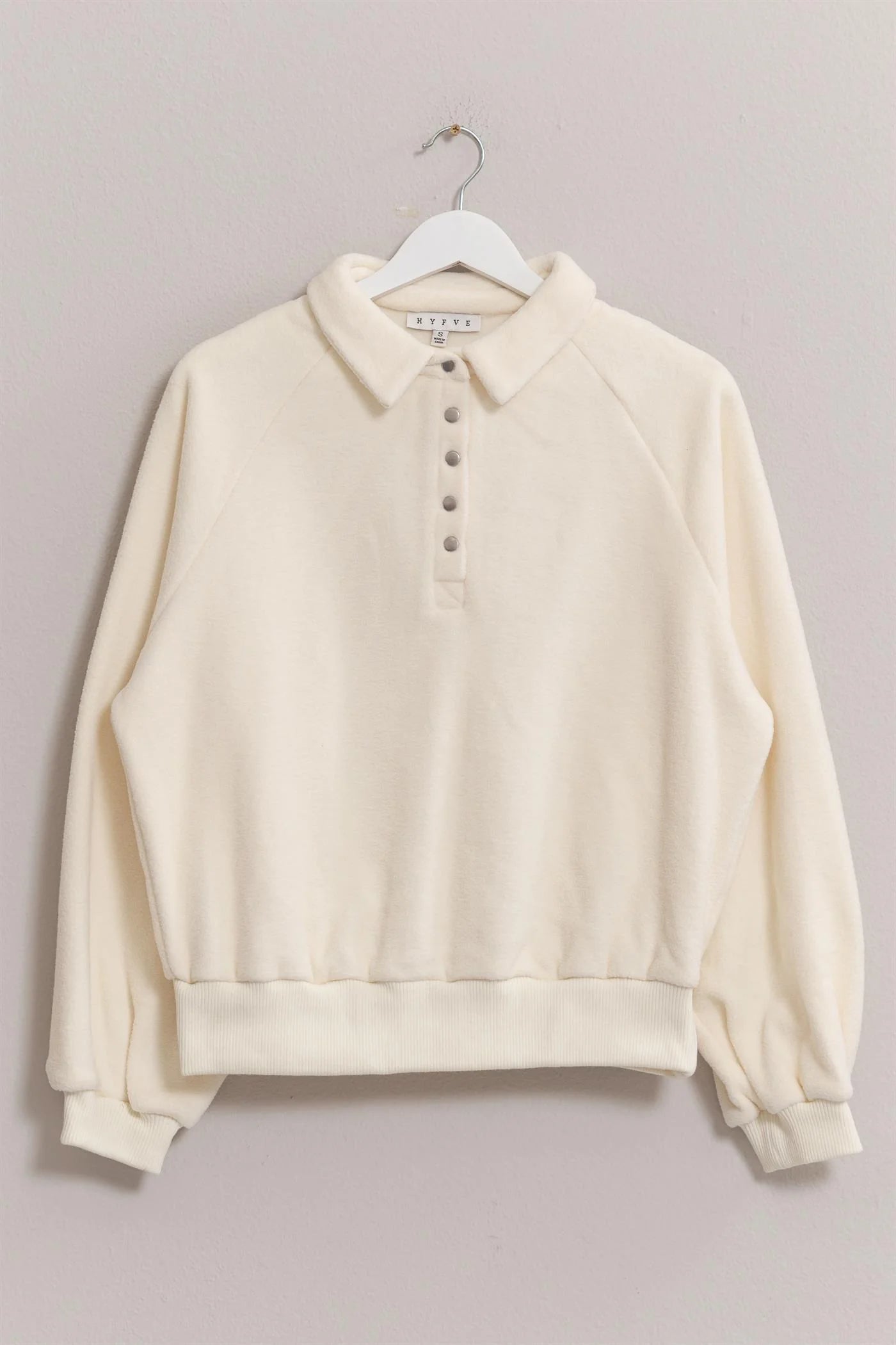 Soft fleece pullover with button placket and ribbed trim