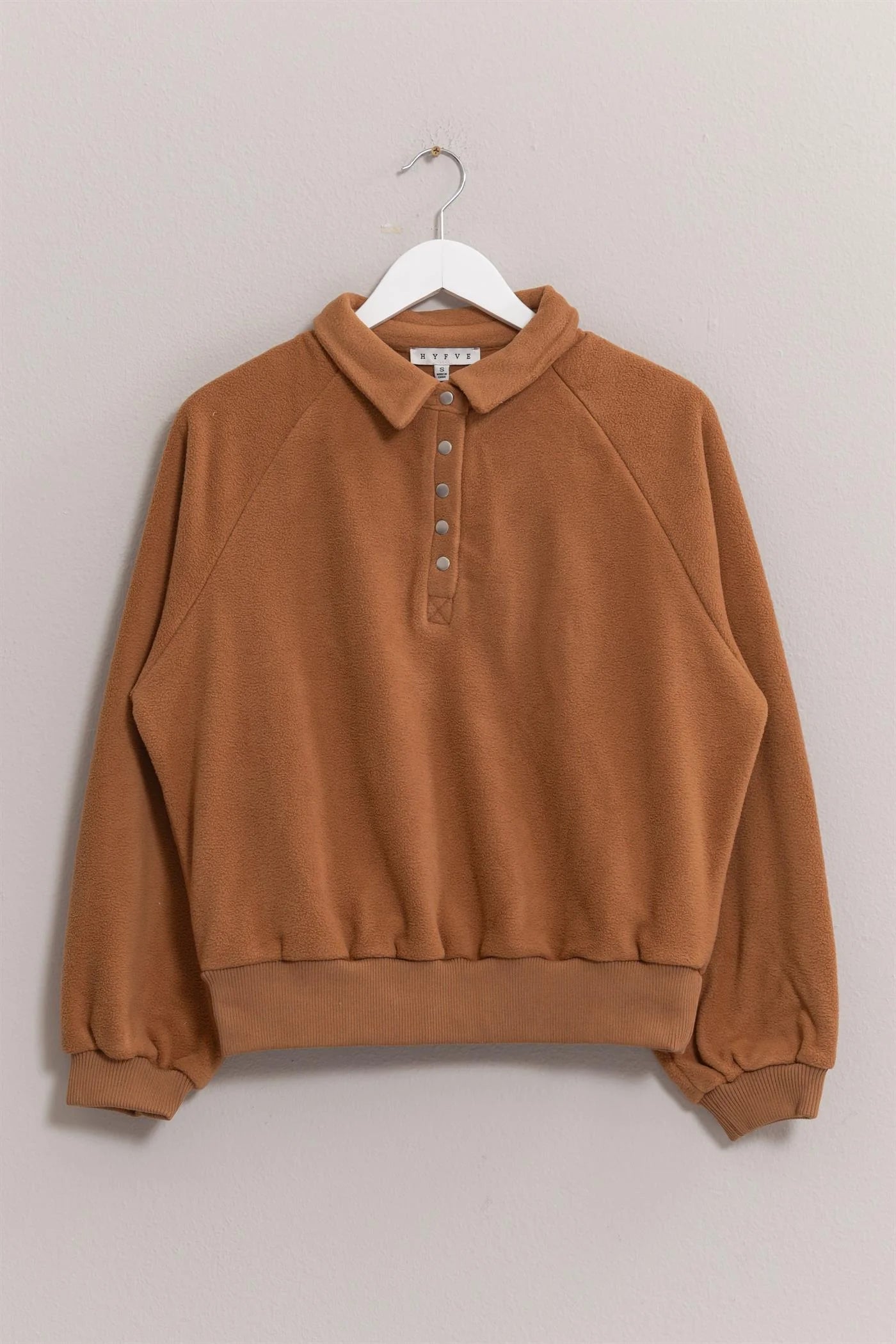 Soft fleece pullover with button placket and ribbed trim